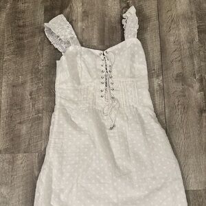 White, open back, corset style dress